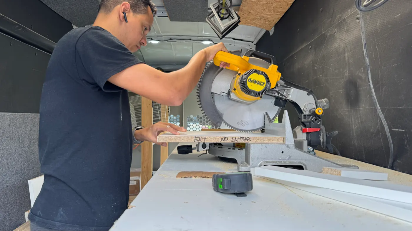 Custom Closet Installation team cutting panels in-house